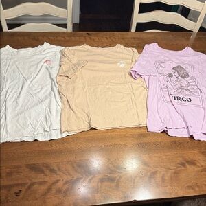 Aerie/American Eagle Set of Three Graphic T-Shirts in White, Beige, and Purple